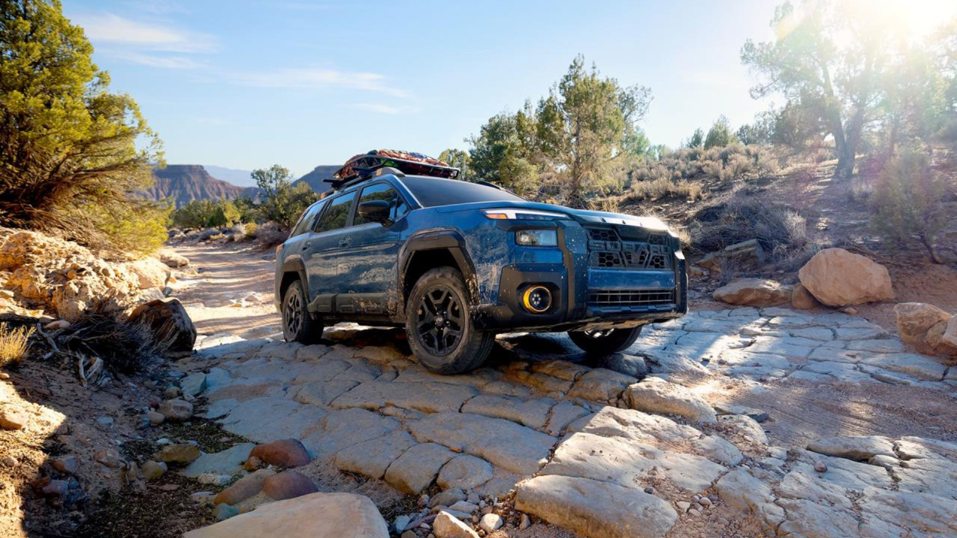 Subaru Outback Wilderness 2026 sur un chemin roccailleux